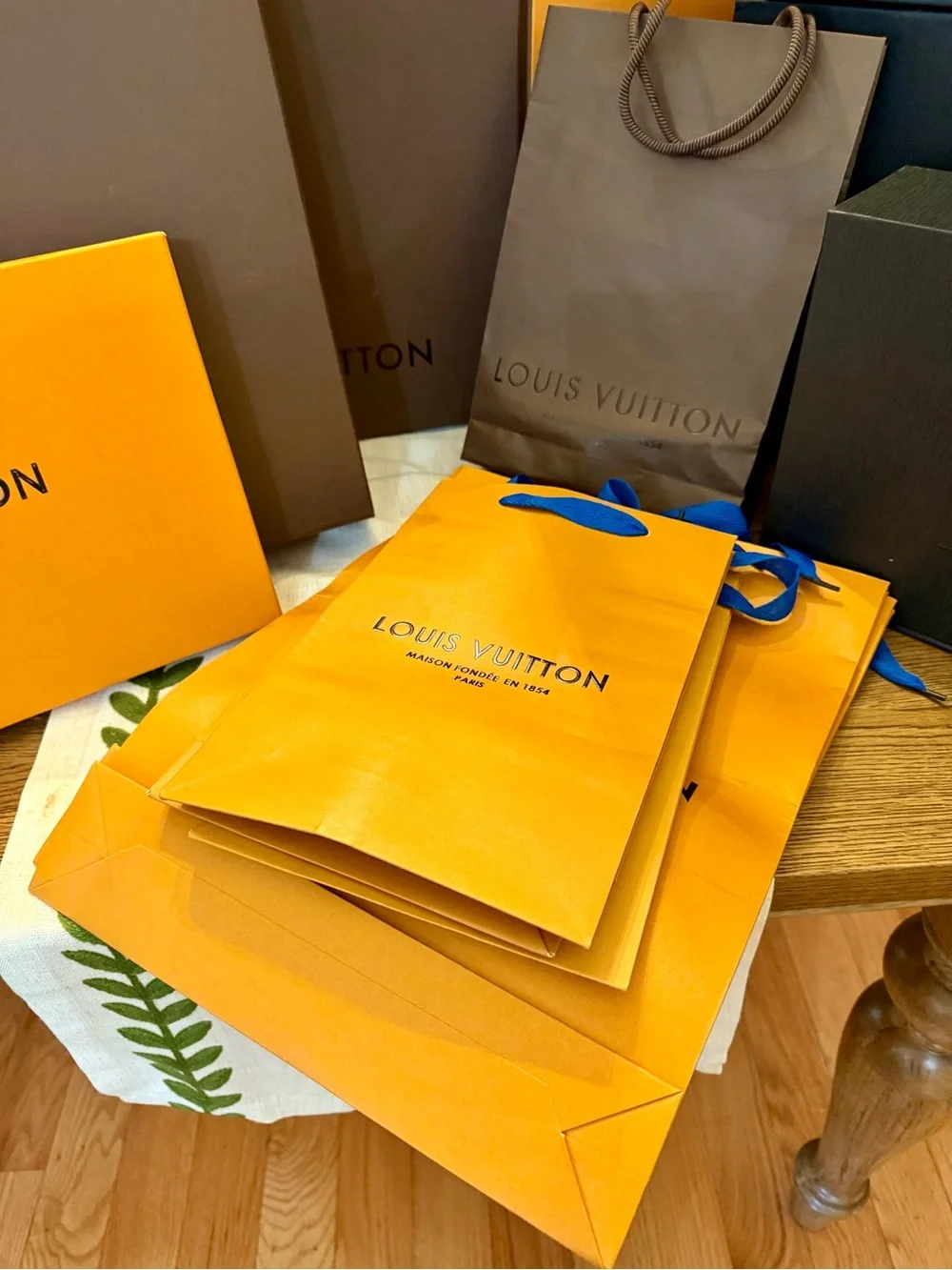 Louis Vuitton Orange and Brown Gift Boxes and Bags Display